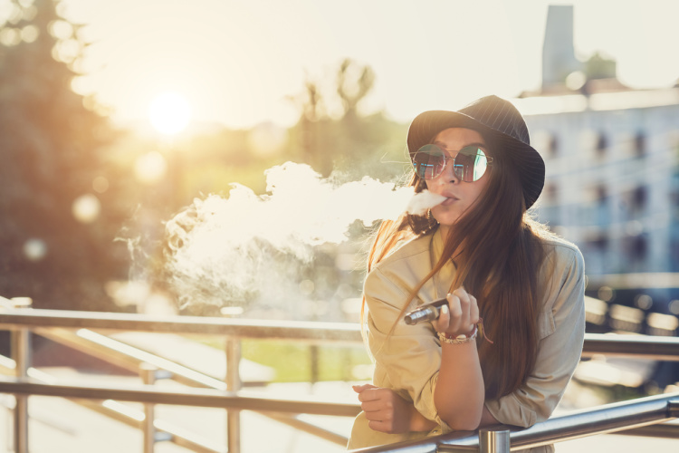 vape cartridge woman vaping